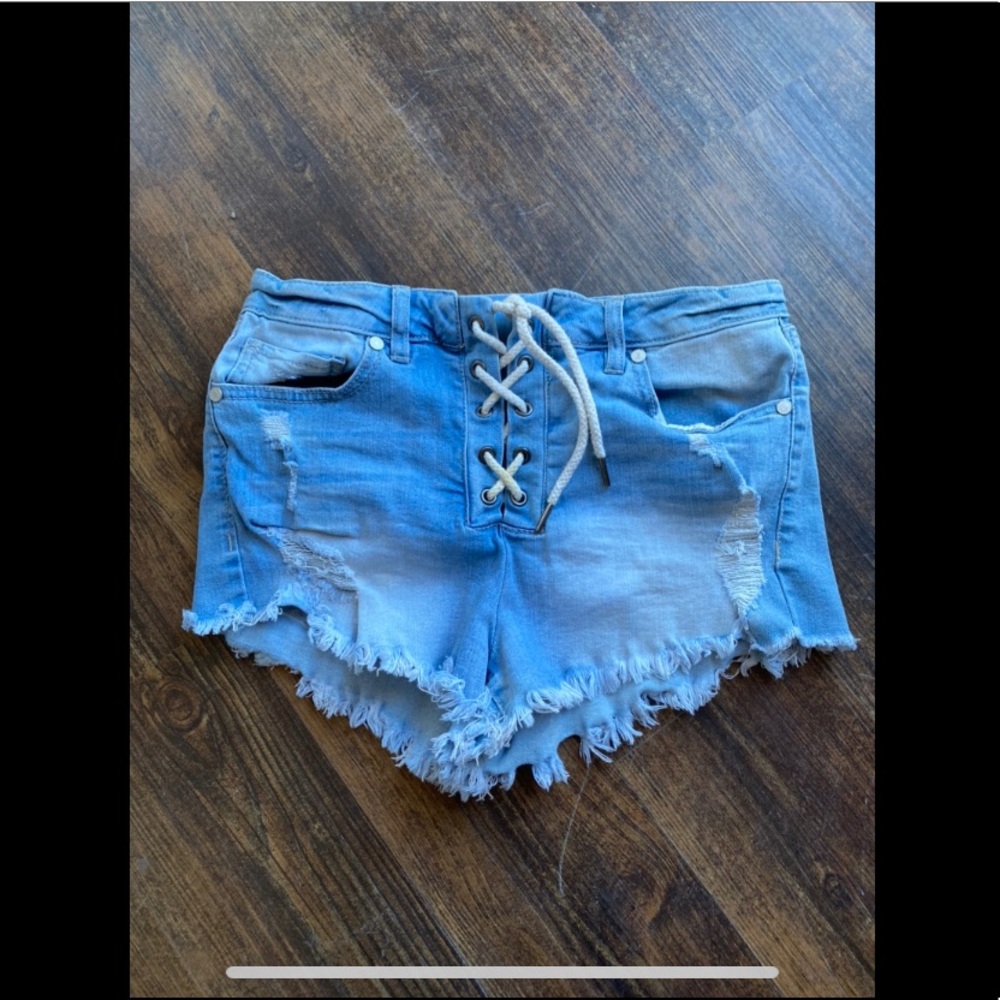 Stretchy Refuge denim shorts with lace up